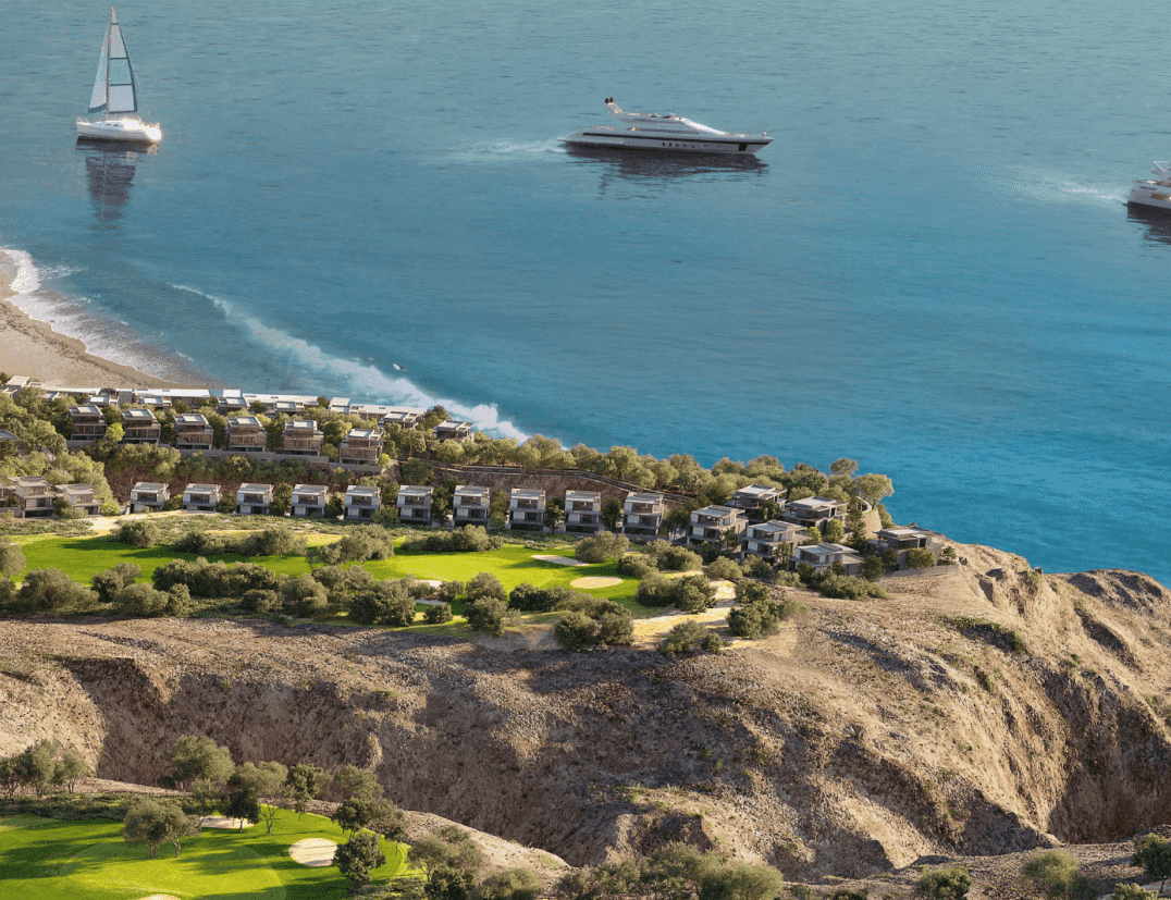 Coastal landscape and residences at AIDA Muscat, viewed above the sea